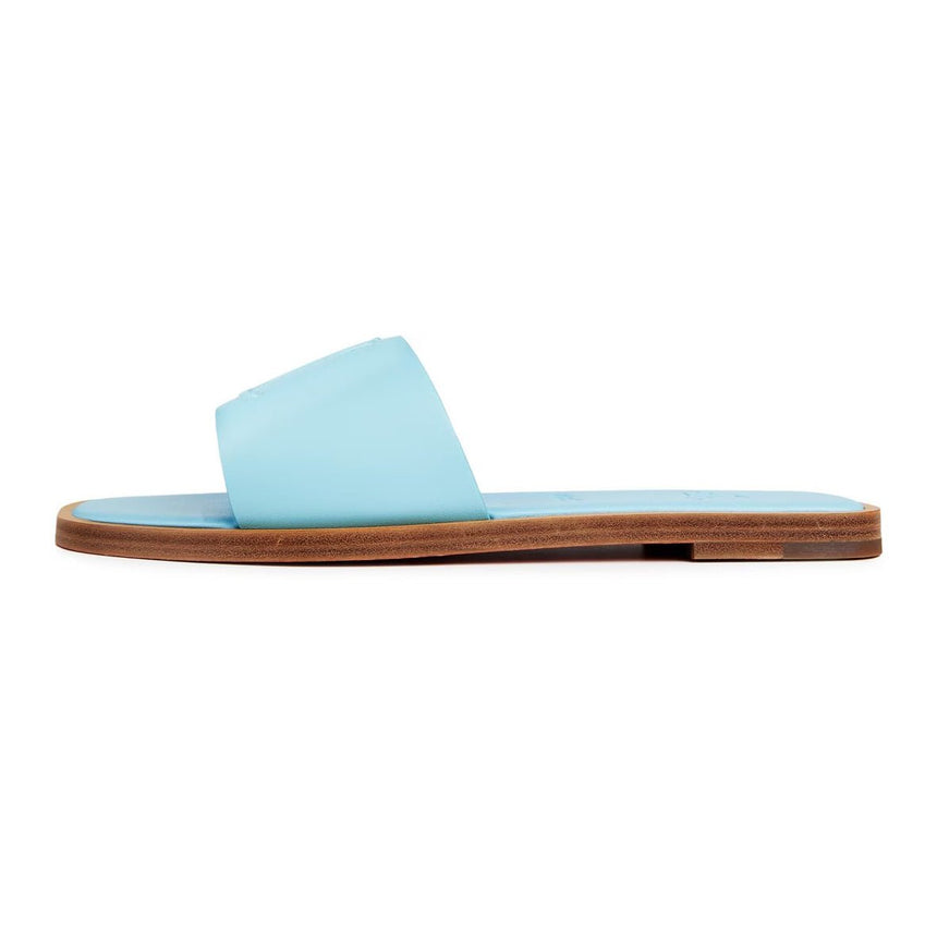 Christian Louboutin CL Embossed Leather Mules in Mineral Blue - Boinclo - Outlet Sale Under Retail