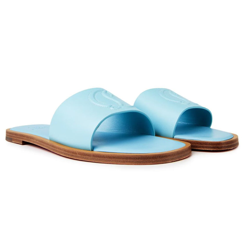 Christian Louboutin CL Embossed Leather Mules in Mineral Blue - Boinclo - Outlet Sale Under Retail