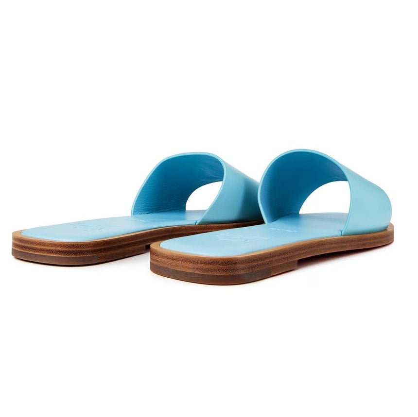 Christian Louboutin CL Embossed Leather Mules in Mineral Blue - Boinclo - Outlet Sale Under Retail