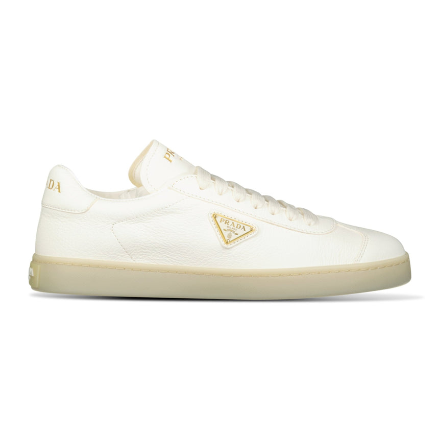 Prada Leather Trainers with Gold Metal Appliqué in Avorio - Boinclo - Outlet Sale Under Retail